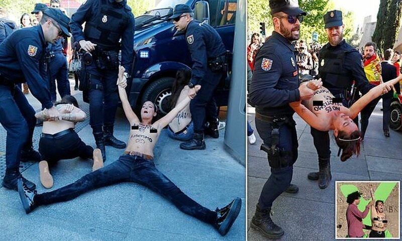 Испанские феминистки вышли с голой грудью против националистов (10 фото)