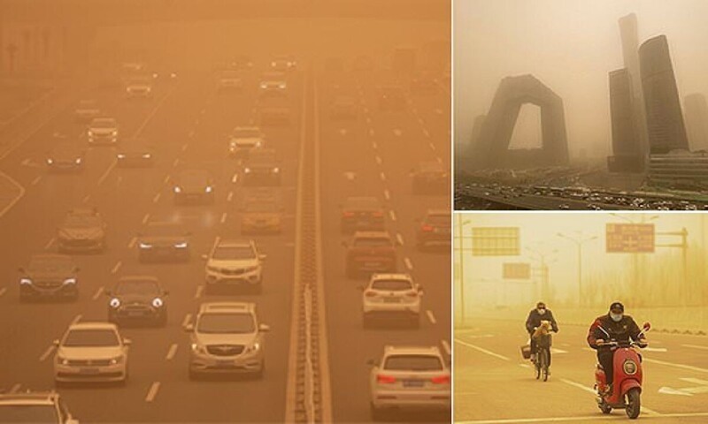 Пекин задохнулся в песчаной буре - сильнейшей за последние 10 лет (22 фото)